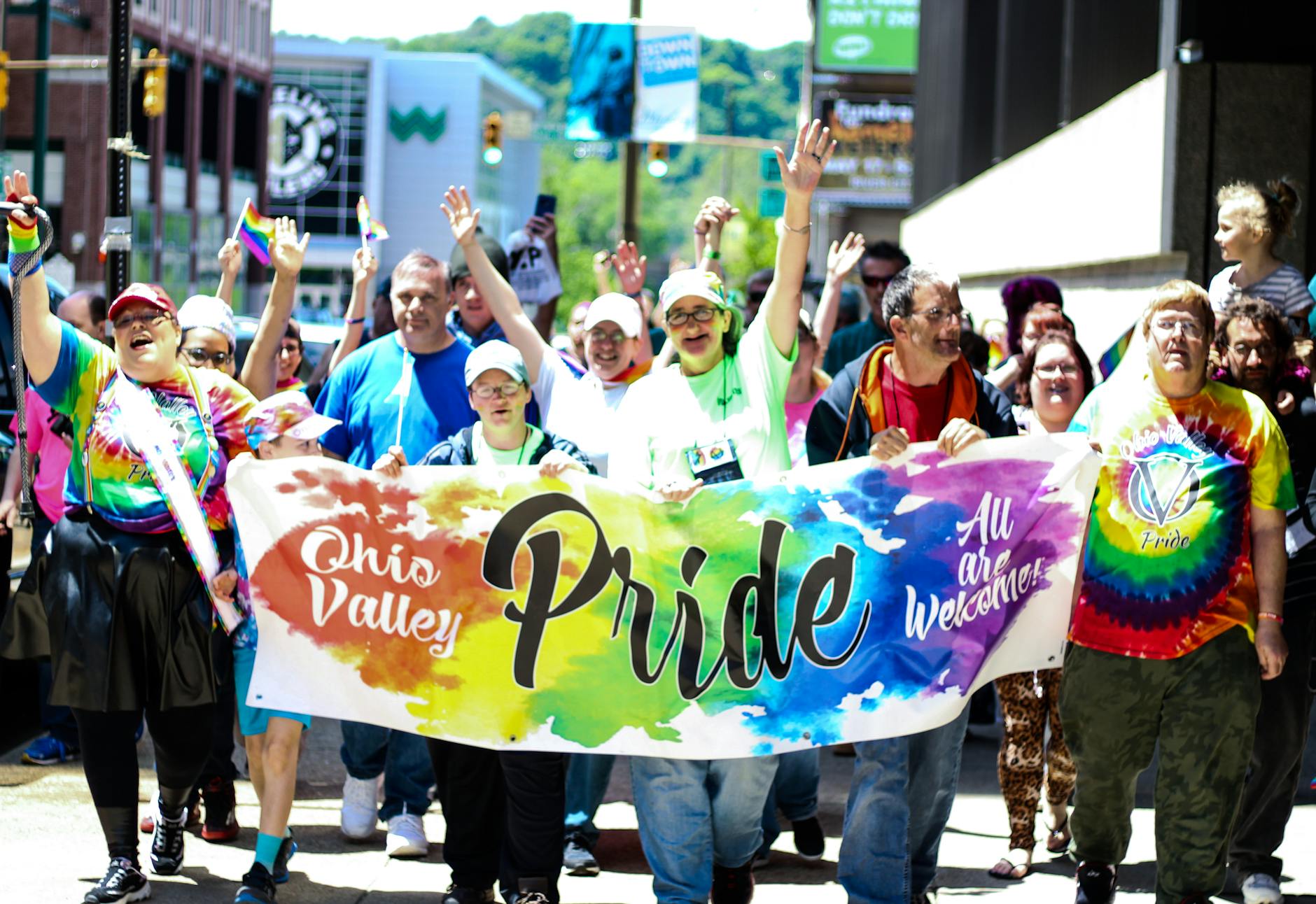 group of people parading in street
